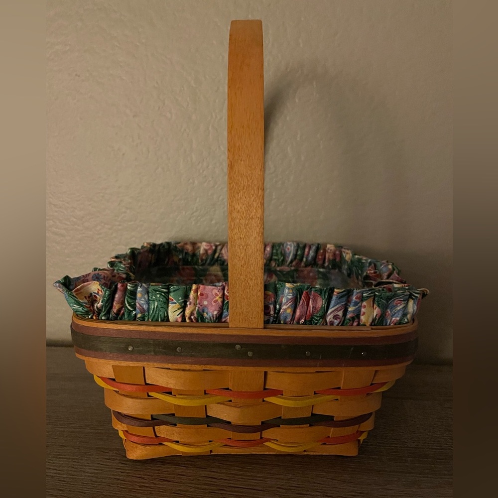 Medium Longaberger Easter basket, with fabric and plastic liner.